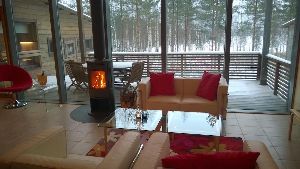 Kuoreksenniemi Villas & Lakehouse Puumala Pokoj fotografie