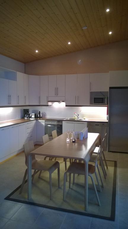 Kuoreksenniemi Villas & Lakehouse Puumala Pokoj fotografie